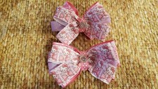 Lot of two Handmade Hair bows Hello kitty Floral swirls and Glitter