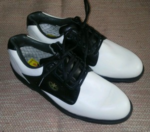 mens black and white saddle golf shoes