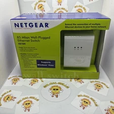 Single Netgear XE104 85 Mbps Powerline Wall Plugged 4-Port Ethernet Switch 
