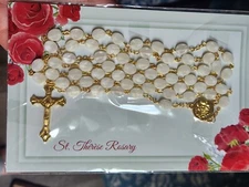 St. Therese of  Lisieux” Rosary beads. Pearl colored  with gold colored crucifix