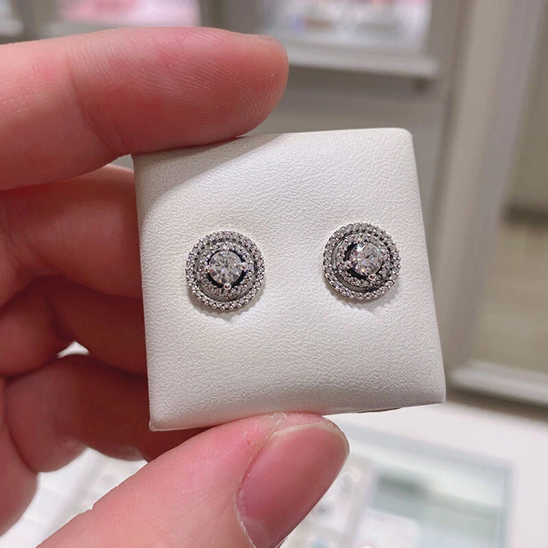 Silver halo store stud earrings