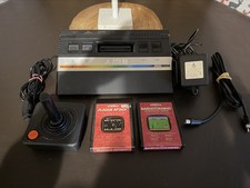 Atari 2600 black console with 2 games, joystick and original power supply