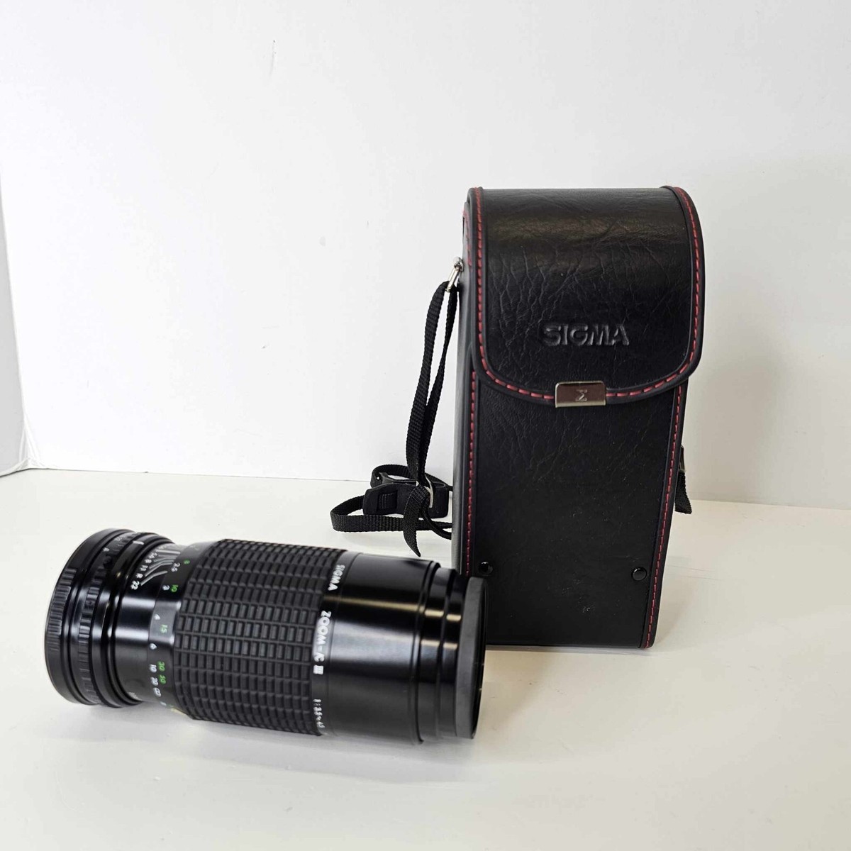 SIGMA ZOOM-KⅢ 1:3.5〜4  f=75〜210mm φ52 SIGMA Zoom K III 1:3.5-4.5 f = 75~210mm With Case Filter Lens Hood