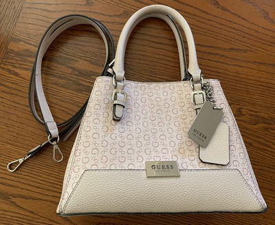 pink guess purse with charms