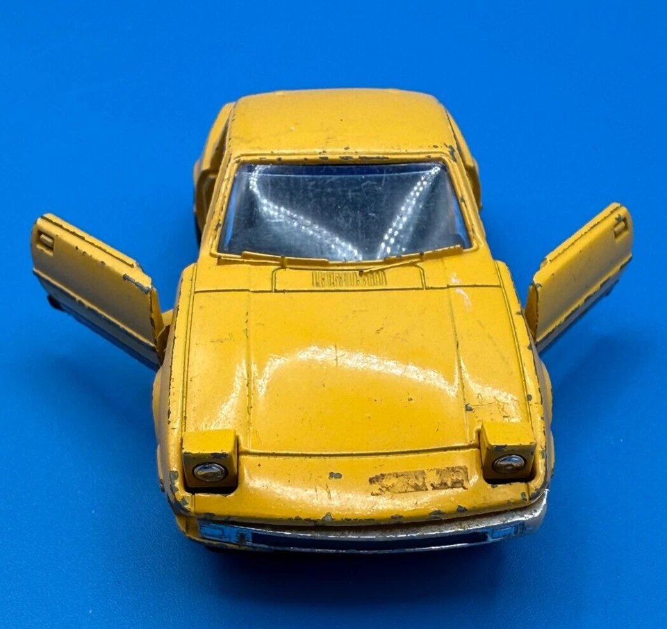 Shinsei Mazda Savanna RX-7 Japan 1:37 VTG Diecast w/ Moving Headlights Yellow - Image 2 of 4