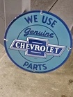 VINTAGE 1958 WE USE GENUINE CHEVROLET PARTS  PORCELAIN SIGN 12"