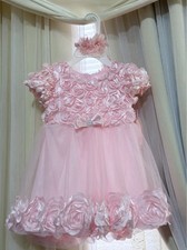 Girls' dress in baby pink with a floral design, size 3T