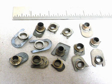 14 old- antique clock winding hole grommets & clips   (A)