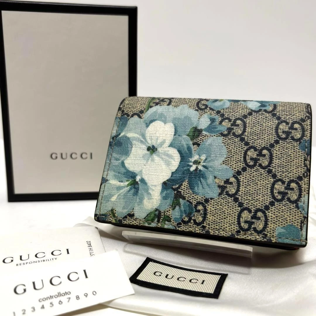 Authentique portefeuille Gucci couleur beige rouge V8,5 cm L11 cm GG Supreme Blooms Michele