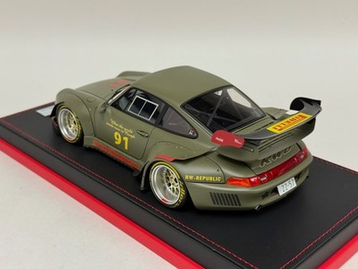 1/18 Ignition model Porsche 911 Matte Green on a custom Leather