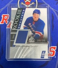 Alexis Lafreniere RC 2020-21 UD SP Game Used Rookie BLUE Sweaters 190/249 RS-AF