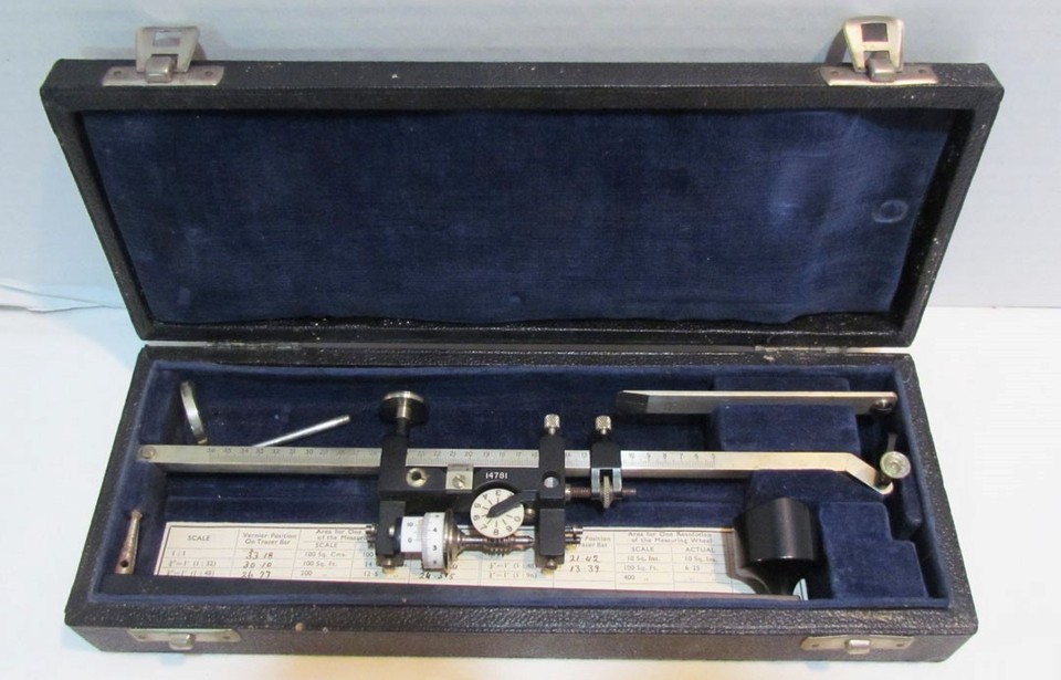 A Stanley Allbrit polar planimeter — a mechanical area-measuring device that looks like a steampunk compass and actually computes integrals with moving parts.