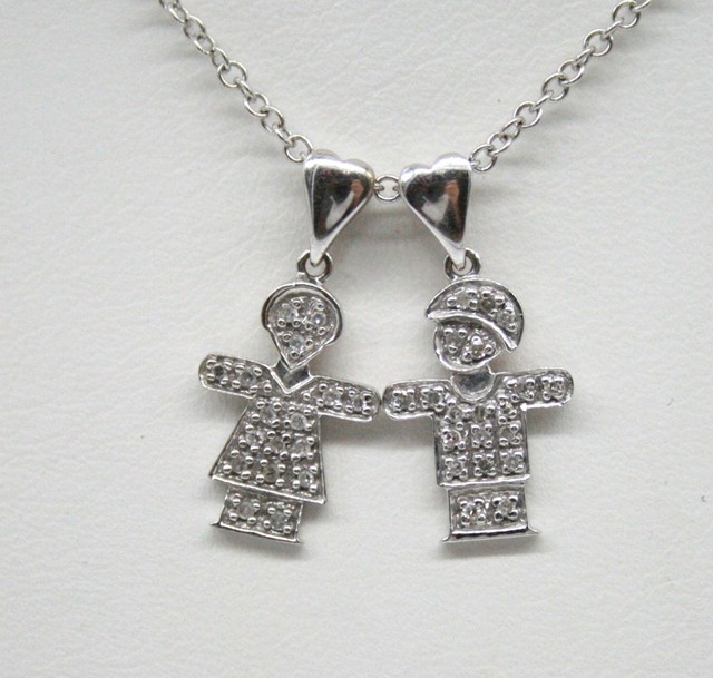 14k White Gold Boy & Girl Diamond Pendant. 17.5" chain each is 16mm x