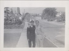 WW2 Photo of Navy Sailor and Woman Standing on Suburban Road