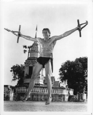 Tarzan's three Challenges Jock Mahoney bare chested spread eagled on