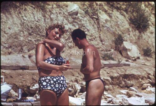 Muscular Thong-Type Swimsuit Man & Woman Apply Lotion Vintage 1958 Slide Photo - Picture 1 of 1