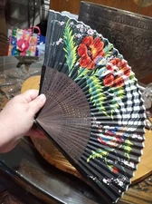 Vintage folding ladies hand fan. Hand-painted exotic bird, flowers