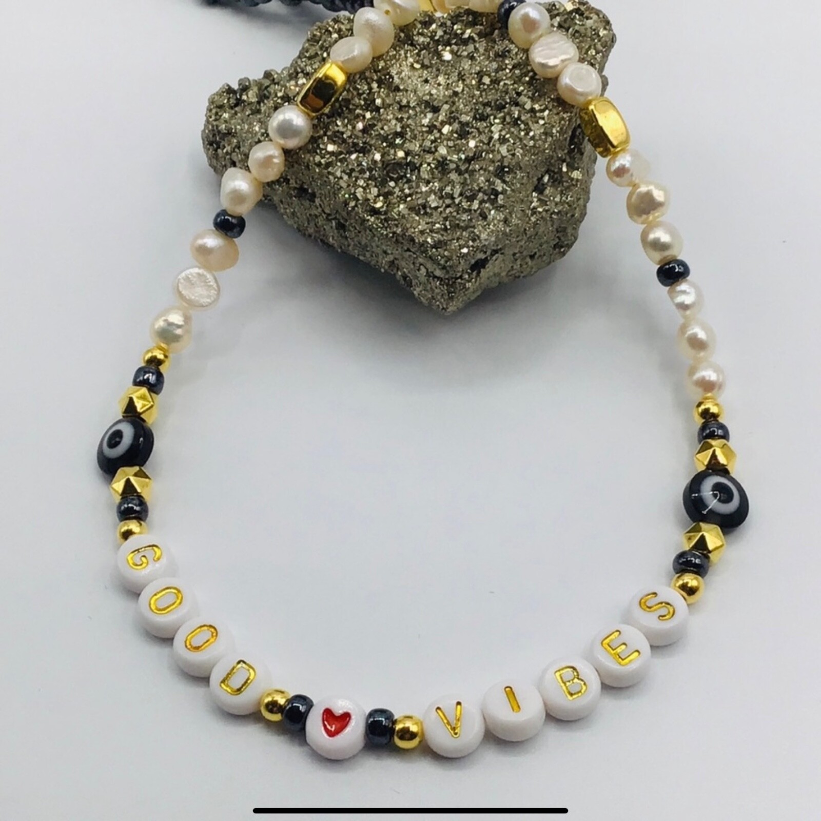 Evil Eye Necklace with Freshwater Pearls Hematite Beads and Gold Heart Charm-image