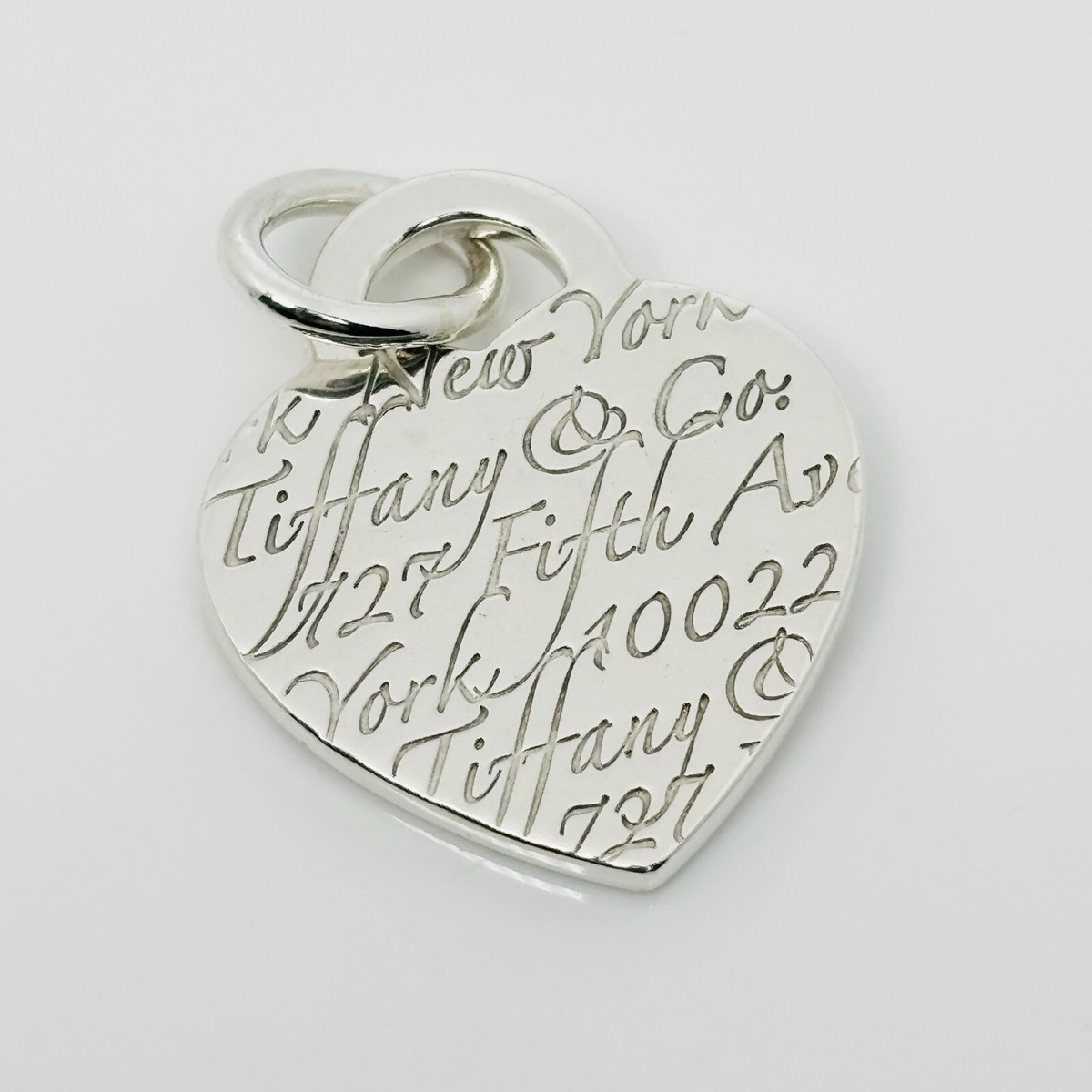 Tiffany & Co Notes 727 Fifth Ave Wave Herat Pendant or Charm in 