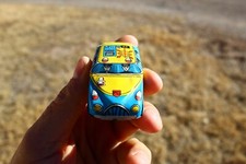 Post WW 2 tin toys made in Japan, 1950s. Police car P.D. 110, motorcycle with ri