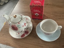 One Cup Teapot And Teacup And Saucer Plus Sone Flavour Tea
