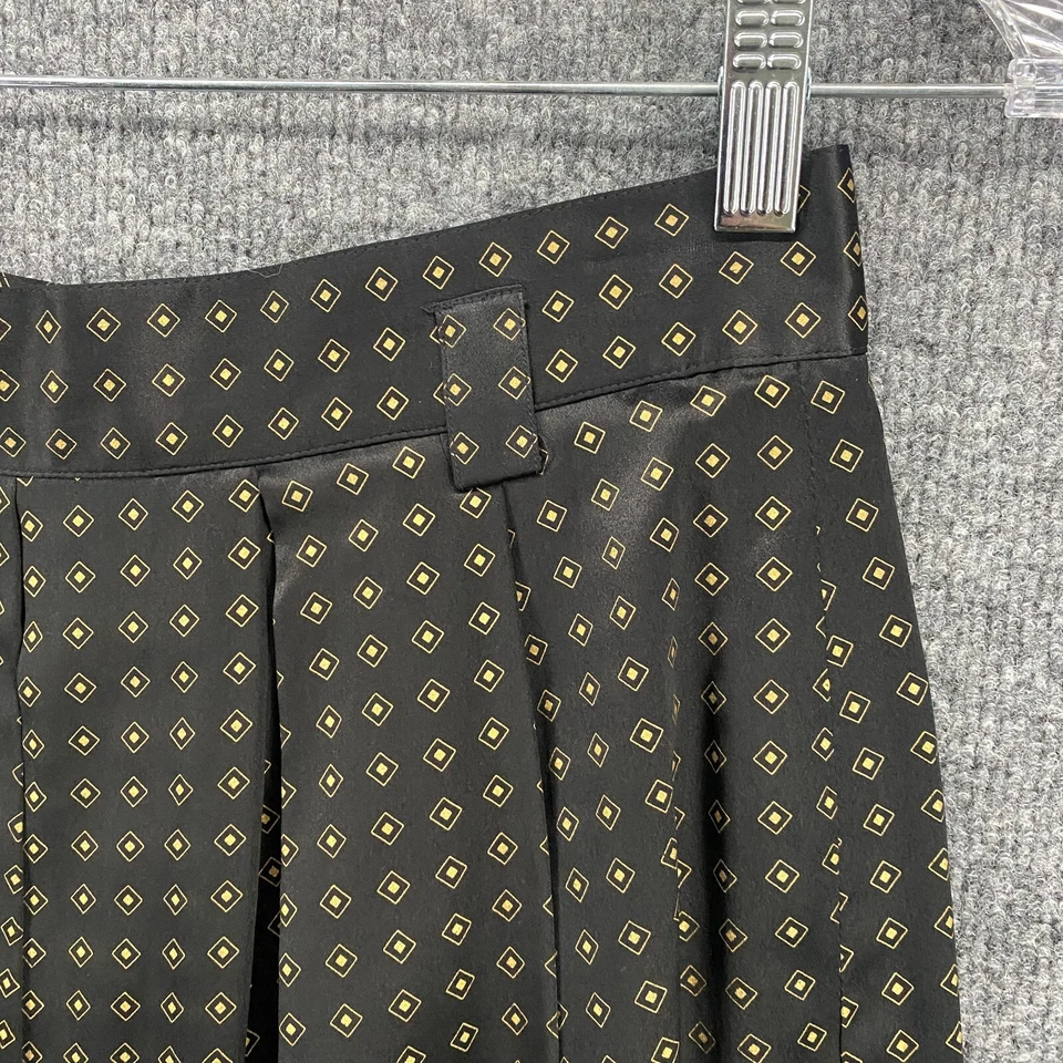 Falda Jones New York Petite de seda para mujer 10P negra estampado línea A modesta clásica Foto 3 de 4