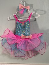 Weissman dance costume in pink and blue with sequins and a matching hair bow