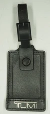 Tumi luggage black w silver hang tag