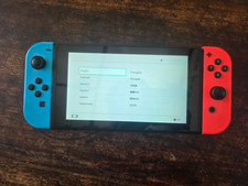 Nintendo Switch 32 GB Console - Neon Blue and Red with case and charging dock