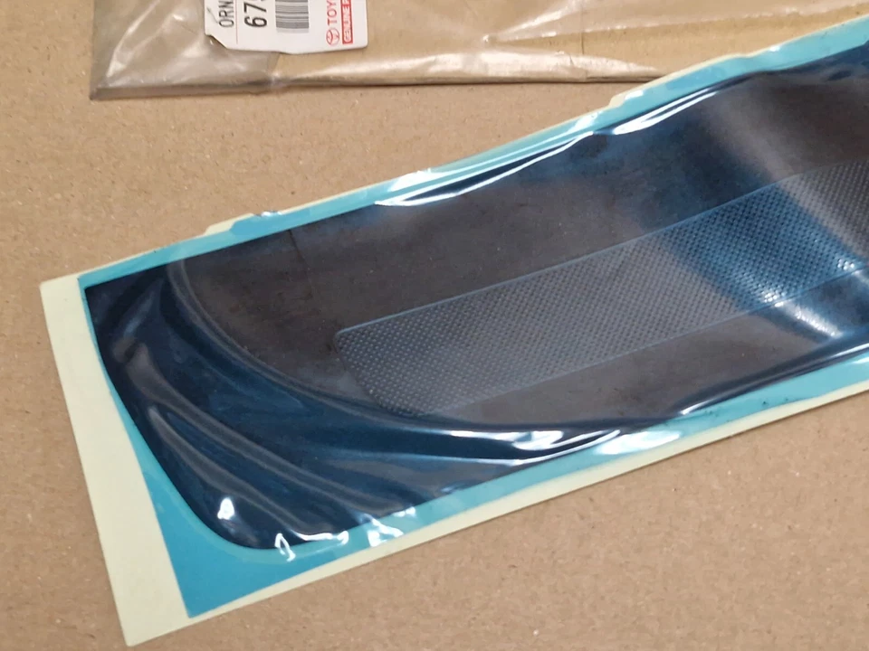 Adorno rasguño puerta Toyota Corolla Verso 2005-2007 6791964010 genuino NUEVO - Imagen 4 de 4