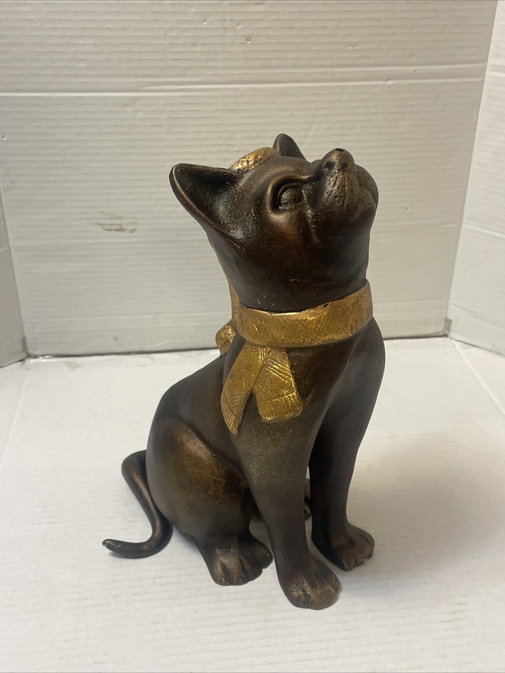 A 12-inch cast aluminum cat sculpture with antique bronze finish — weighty, detailed garden art that doesn't look like it came from a big-box store.