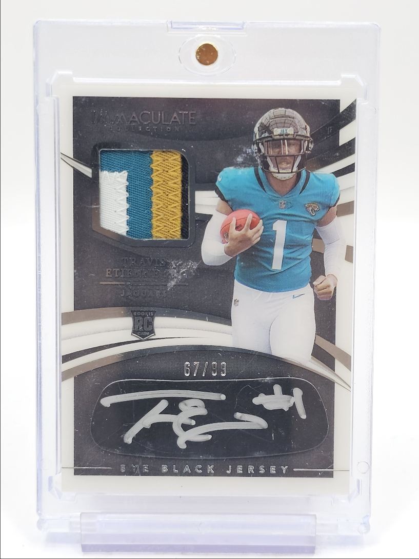 TRAVIS ETIENNE JR. 2021 IMMACULATE RPA ROOKIE EYE BLACK PATCH AUTO /99 Q1895