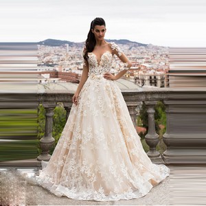 champagne long sleeve wedding dress