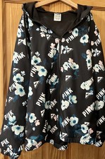 Women’s Raincoat Size Xs/s/ 8-10. Victoria’s Secret. Black With Logo Pattern.