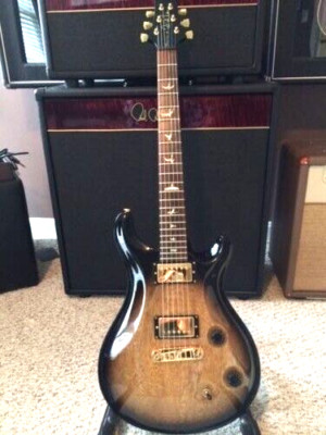 2007 PRS McCarty ~ Korina body with Brazilian fingerboard.  Rare.   6lbs.