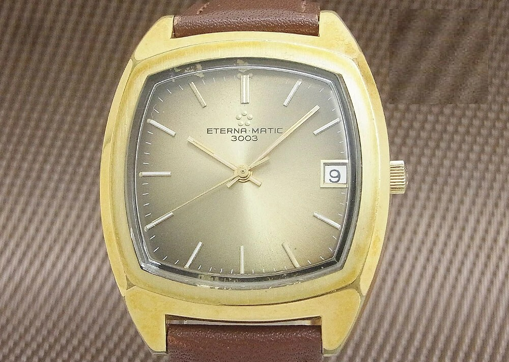 Eterna Matic 3003 GP/SS Tonneau Automatic 35mm Gold Dial Date