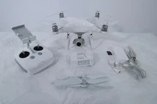 DJI Phantom 4 Drone with Original Accessories and Case