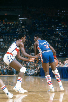 Fred Carter Philadelphia 76ers dribbles the ball while guarded by - Old Photo