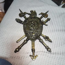 CAST METAL EUC COAT OF ARMS SHIELD CREST 1960 VINTAGE CROSS SWORDS WALL PLAQUE