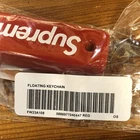 Porte clés flottant Supreme FW23A108 rouge   NEUF JAMAIS OUVERT