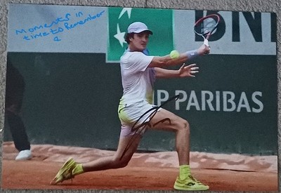 joao fonesca schneidet eine Rückkehr auf Ton während des Spiels signiert 12x8 Foto