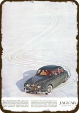 1960 Jaguar 3.8 Xk Car Drives In Snow Vintage-look Decorative Replica Metal Sign 1960 Jaguar 3.8 Xk Car Drives In Snow Vintage-look Decorative Replica Metal Sign