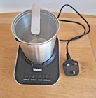 milk frother  with stainless steel jug,  working order but handle of jug missing