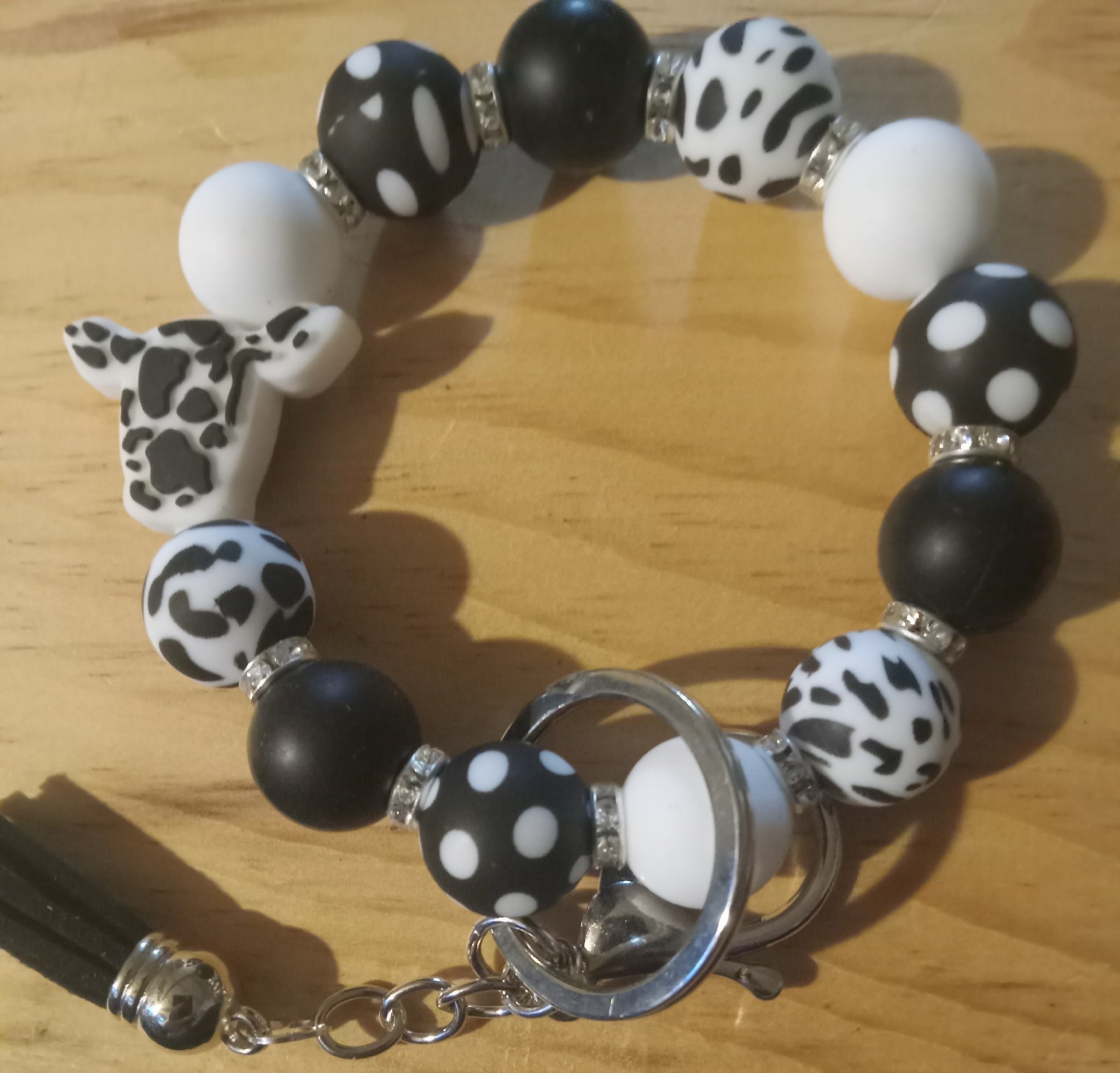 Black Cow Elastic Wristlet Keychain with Mini Tassel