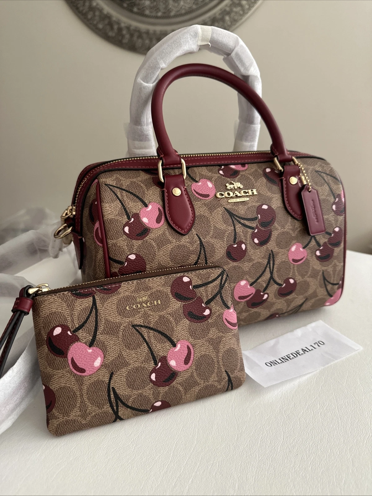 Borsa a tracolla Coach Rowan firmata tela stampa ciliegia CY692 e polso CZ450