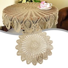 Tovaglia rotonda senza tempo ed elegante con delicato motivo cavo all'uncinetto