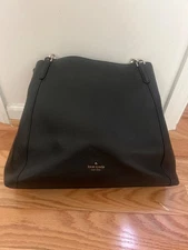 Black kate spade handbag. Leather, shoulder strap. Excellent condition. 