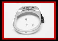 208467  CANON AE-1 FRONT APRON REPAIR PART WITH SCREWS  USED AE1