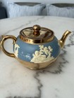 Porcelain tea set with neoclassical reliefs by Gibson's Staffordshire — photo 4