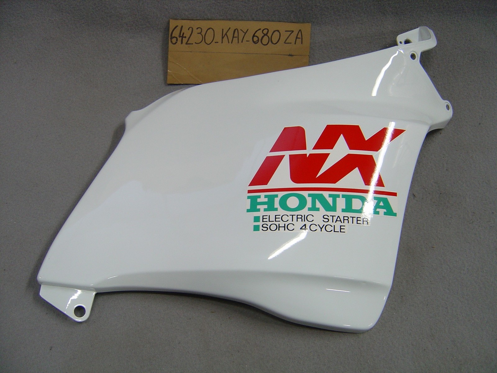 Flanc de carénage droit moto Honda NX125 1991 piece 64230KAY680ZA trail